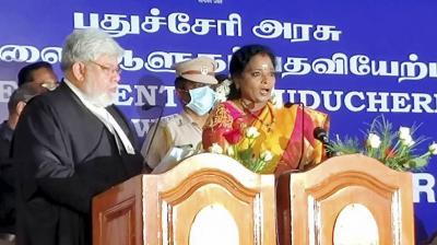 Telangana Governor Tamilisai Soundararajan being sworn in Lt Governor of Puducherry, an additional charge, by Chief Justice of Madras High Court Sanjib Banerjee during a brief ceremony at Raj Nivas in Puducherry, Thursday, February 18, 2021. (PTI)