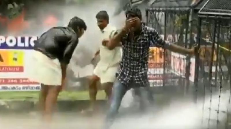 The trouble started when the activists tried to break barricades put up by police a few meters away from the minister's house. (Photo: ANI/Twitter) The trouble started when the activists tried to break barricades put up by police a few meters away from the minister's house. (Photo: ANI/Twitter)