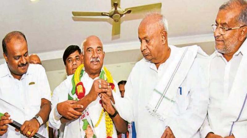 A file photo of former MP A.H. Vishwanath with JD(S) supremo H.D. Deve Gowda A file photo of former MP A.H. Vishwanath with JD(S) supremo H.D. Deve Gowda