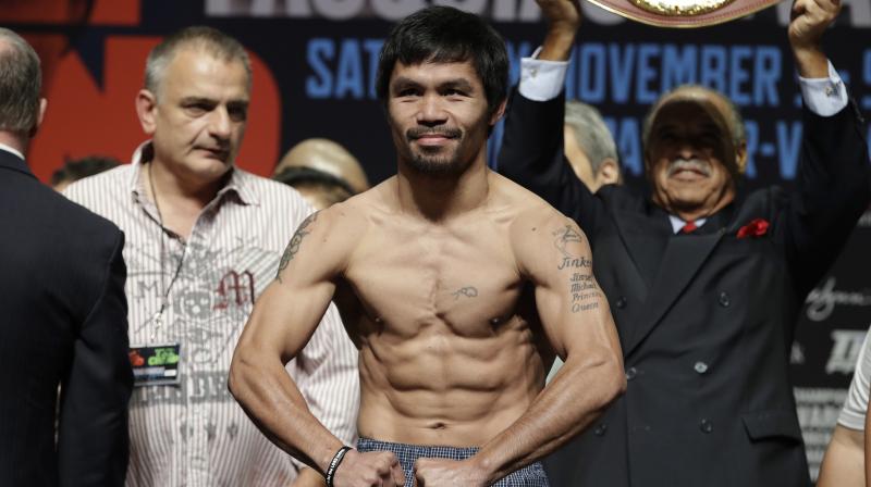 Pacquiao won the WBO title for the first time in 2010 when he beat Miguel Cotto. (Photo: AP) Pacquiao won the WBO title for the first time in 2010 when he beat Miguel Cotto. (Photo: AP)