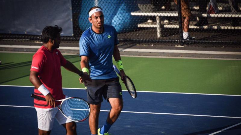 Leander Paes and Purav Raja fought off a match point to shock formidable fifth seeds Bruno Soares and Jamie Murray 7-6(3), 5-7, 7-6(6) to reach pre-quarters of the Australian Open. (Photo:Twitter / Purav Raja) Leander Paes and Purav Raja fought off a match point to shock formidable fifth seeds Bruno Soares and Jamie Murray 7-6(3), 5-7, 7-6(6) to reach pre-quarters of the Australian Open. (Photo:Twitter / Purav Raja)