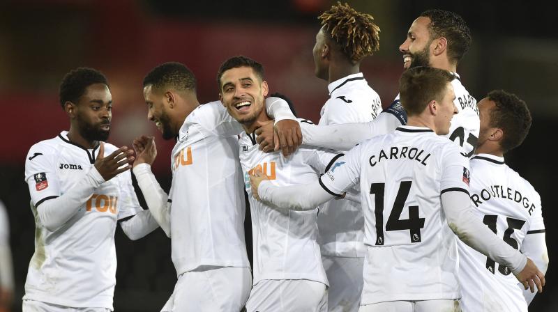 Carlos Carvalhal has masterminded wins for Swansea over Liverpool and Arsenal in recent weeks to lift the Welsh club out of the Premier League's relegation zone. (Photo: AP) Carlos Carvalhal has masterminded wins for Swansea over Liverpool and Arsenal in recent weeks to lift the Welsh club out of the Premier League's relegation zone. (Photo: AP)