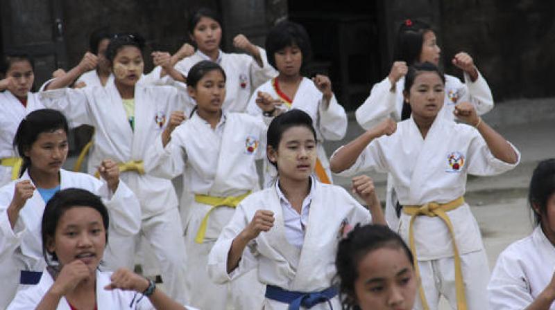 Internally displaced girls in Jeyang village camp, near the China border, join the karate training for self-defense in Kachin state, Myanmar. (Photo: AP) Internally displaced girls in Jeyang village camp, near the China border, join the karate training for self-defense in Kachin state, Myanmar. (Photo: AP)
