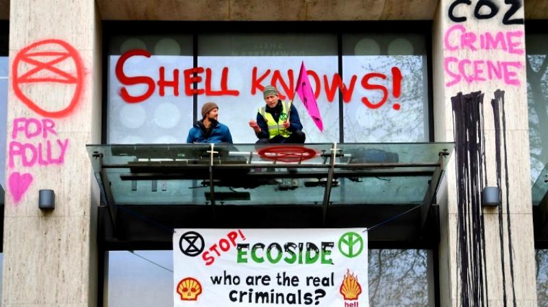 Campaigners daubed graffiti and smashed a window at the Shell Centre building. (Photo: AFP) Campaigners daubed graffiti and smashed a window at the Shell Centre building. (Photo: AFP)