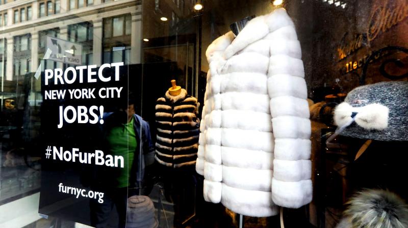 A sign by furnyc.org in the window of Victoria Stass Collection in New York's fur district. (Photo: AP) A sign by furnyc.org in the window of Victoria Stass Collection in New York's fur district. (Photo: AP)
