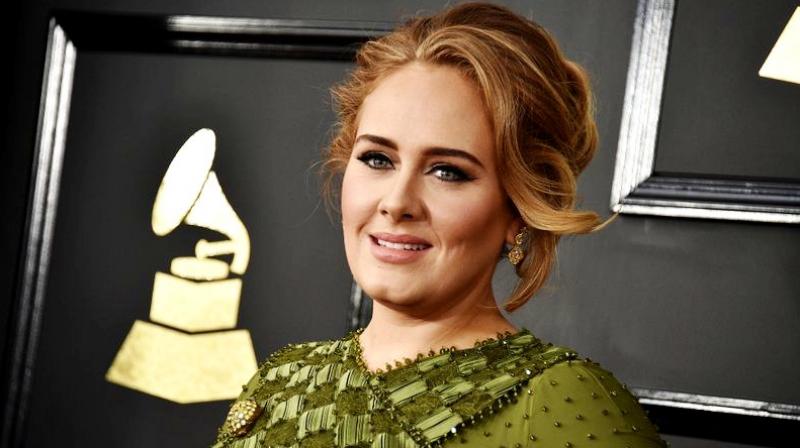 Adele at the 59th annual Grammy Awards at the Staples Center in Los Angeles. (Photo: AP) Adele at the 59th annual Grammy Awards at the Staples Center in Los Angeles. (Photo: AP)