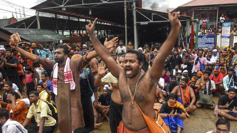 The temple witnessed high drama recently with around a dozen women in the 10-50 age group being prevented by protesting devotees from entering it after the doors were opened for all women following the apex court verdict. (Photo: File) The temple witnessed high drama recently with around a dozen women in the 10-50 age group being prevented by protesting devotees from entering it after the doors were opened for all women following the apex court verdict. (Photo: File)