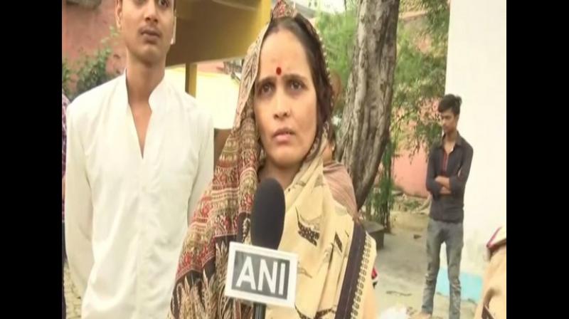 'We are going to meet Yogi Adityanath. The Chief Minister had given us time to meet at around 11 am today. The police are taking us there,' Tiwari's widow said. (Photo: ANI) 'We are going to meet Yogi Adityanath. The Chief Minister had given us time to meet at around 11 am today. The police are taking us there,' Tiwari's widow said. (Photo: ANI)
