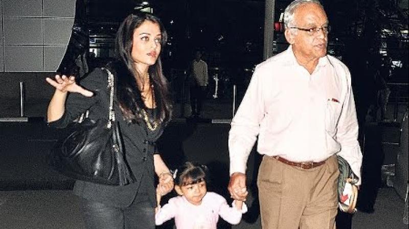 Aishwarya Rai Bachchan with her father Krishnaraj Rai and daughter Aaradhya. Aishwarya Rai Bachchan with her father Krishnaraj Rai and daughter Aaradhya.