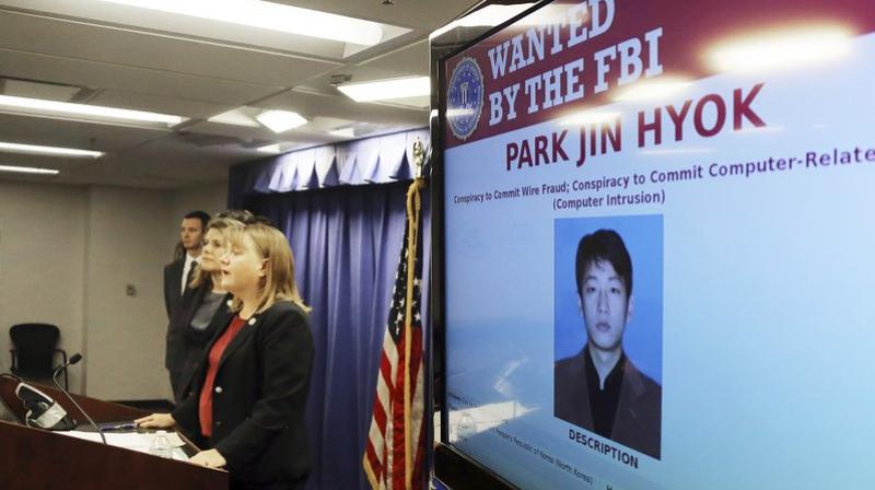 United States Attorney Tracy Wilkison announces a criminal complaint being filed against a North Korean national accused in a series of destructive cyberattacks around the world, at a news conference in Los. The complaint alleges Park Jin Hyok, computer programmer accused of working at the behest of the North Korean government, was charged Thursday in connection with several high-profile cyberattacks, including the Sony Pictures Entertainment hack and the WannaCry ransomware virus that affected hundreds of thousands of computers worldwide. (AP Photo/Reed Saxon) United States Attorney Tracy Wilkison announces a criminal complaint being filed against a North Korean national accused in a series of destructive cyberattacks around the world, at a news conference in Los. The complaint alleges Park Jin Hyok, computer programmer accused of working at the behest of the North Korean government, was charged Thursday in connection with several high-profile cyberattacks, including the Sony Pictures Entertainment hack and the WannaCry ransomware virus that affected hundreds of thousands of computers worldwide. (AP Photo/Reed Saxon)