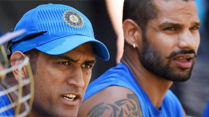 Dhawan, who was dropped from the Test team, is spending time with family in Melbourne following the T20 leg of the Australia while Dhoni has had no cricket since the ODI series against the West Indies ended on November 1. (Photo: PTI) Dhawan, who was dropped from the Test team, is spending time with family in Melbourne following the T20 leg of the Australia while Dhoni has had no cricket since the ODI series against the West Indies ended on November 1. (Photo: PTI)