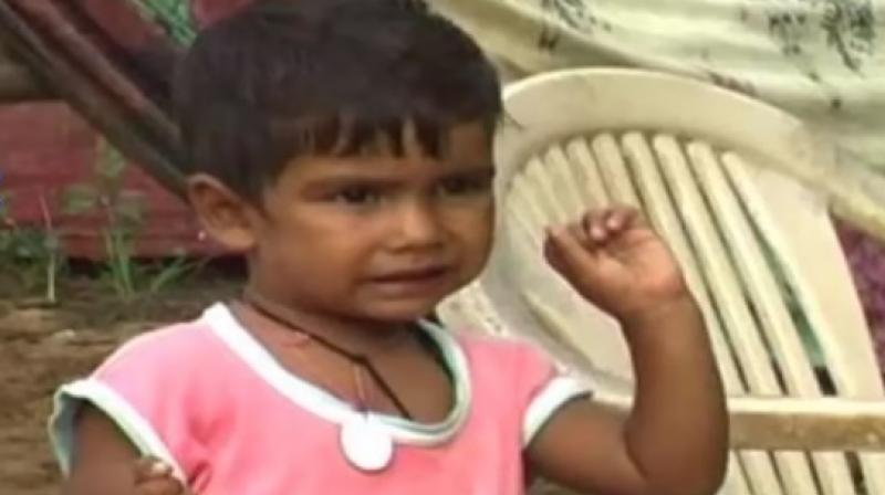 The child's parents tracked down the family in Bholapur and took Jeetan to meet his real father (Photo: YouTube) The child's parents tracked down the family in Bholapur and took Jeetan to meet his real father (Photo: YouTube)