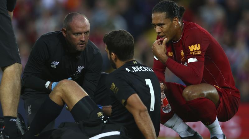 Alisson Becker was injured and substituted during the first half of his side’s 4-1 win against promoted Norwich City last week when he slipped and went down holding his calf before he was helped off the field by support staff. (Photo:AP) Alisson Becker was injured and substituted during the first half of his side’s 4-1 win against promoted Norwich City last week when he slipped and went down holding his calf before he was helped off the field by support staff. (Photo:AP)