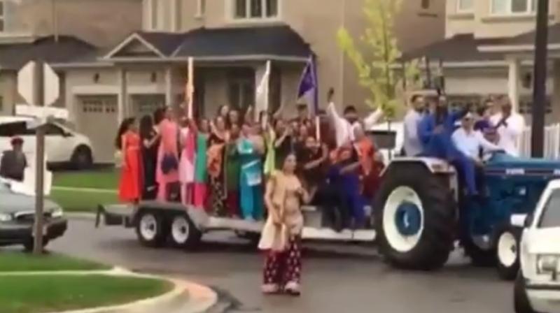 Indian groom arrives wedding on tractor in Canada. (Photo: Facebook / Punjabi Sikh Network) Indian groom arrives wedding on tractor in Canada. (Photo: Facebook / Punjabi Sikh Network)