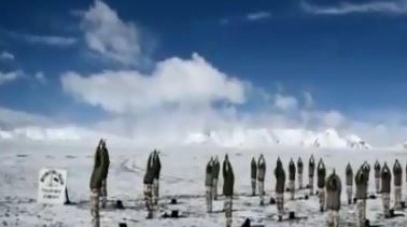 Indo-Tibetan Border Police personnel perform Surya Namaskar in cold desert of Ladakh at an altitude of 18,000 feet. (Photo: Screengrab | ANI) Indo-Tibetan Border Police personnel perform Surya Namaskar in cold desert of Ladakh at an altitude of 18,000 feet. (Photo: Screengrab | ANI)