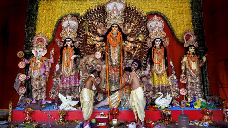 Here is a list of five podcasts that will be helpful to every devotee trying to have a memorable Durga Puja. (Photo: PTI) Here is a list of five podcasts that will be helpful to every devotee trying to have a memorable Durga Puja. (Photo: PTI)