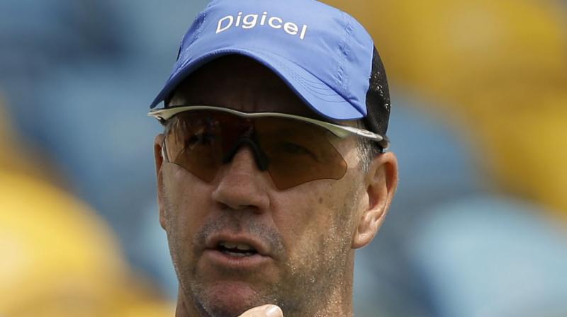 ICC said that West Indies coach Stuart Law, following the dismissal of opener Kieran Powell in the second innings of the second Test against India in Hyderabad, went to the TV umpire's room and made inappropriate comments. (Photo: AP) ICC said that West Indies coach Stuart Law, following the dismissal of opener Kieran Powell in the second innings of the second Test against India in Hyderabad, went to the TV umpire's room and made inappropriate comments. (Photo: AP)
