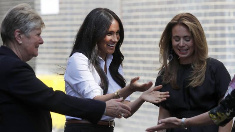 The line includes professional attire such as a blazer, tote bag and trousers. (Photo: AP) The line includes professional attire such as a blazer, tote bag and trousers. (Photo: AP)