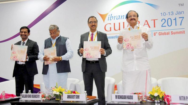 Union I & B Minister M Venkaiah Naidu releases a publication during the Vibrant Gujarat Global Summit 2017 at Mahatma Mandir in Gandhinagar, Gujarat. (Photo: PTI) Union I & B Minister M Venkaiah Naidu releases a publication during the Vibrant Gujarat Global Summit 2017 at Mahatma Mandir in Gandhinagar, Gujarat. (Photo: PTI)