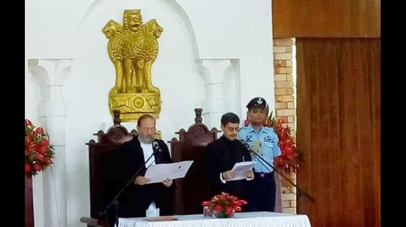 Ravi was administered the oath office at Raj Bhavan by the acting chief justice of Gauhati High Court, Arup Kumar Goswami, in presence of Chief Minister Neiphiu Rio, Assembly Speaker Vikho-o Yhoshu, Opposition Leader TR Zeliang, state ministers, legislators and other dignitaries. (Photo: Twitter I @dimapur24_7)) Ravi was administered the oath office at Raj Bhavan by the acting chief justice of Gauhati High Court, Arup Kumar Goswami, in presence of Chief Minister Neiphiu Rio, Assembly Speaker Vikho-o Yhoshu, Opposition Leader TR Zeliang, state ministers, legislators and other dignitaries. (Photo: Twitter I @dimapur24_7))