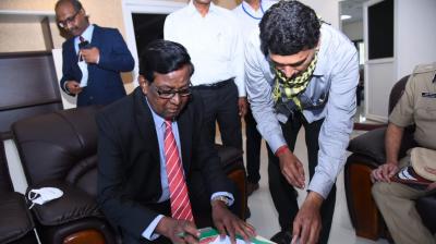 Justice Kanagaraj takes charge as the Andhra Pradesh Election Commissioner, at the State Election Commission (SEC) office in Vijayawada. (Image via ANI Twitter)