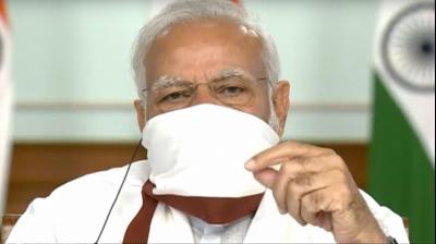 Prime Minister Narendra Modi wearing a protective mask. (PTI)