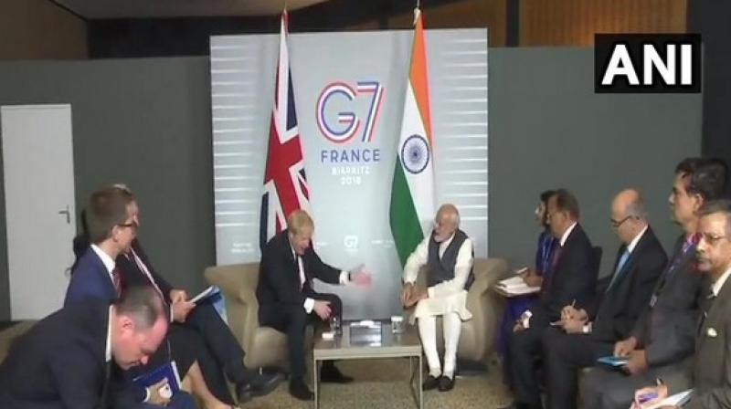 PM Narendra Modi with UK Prime Minister Boris Johnson. (Photo: ANI) PM Narendra Modi with UK Prime Minister Boris Johnson. (Photo: ANI)