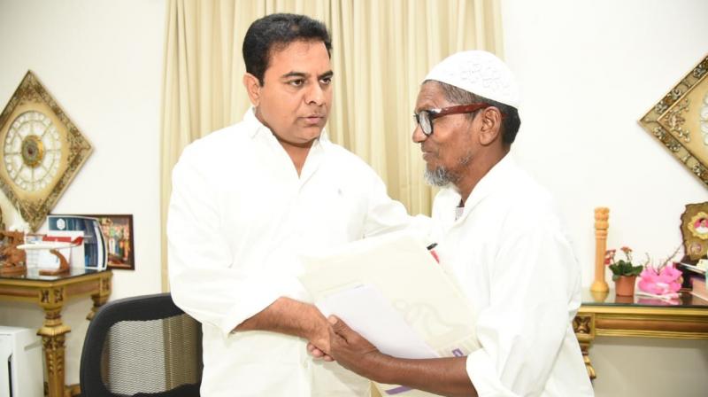 Mr K.T. Rama Rao meets Syed Ali, who sells ice-candy outside St George’s Grammar School, on Thursday. Mr K.T. Rama Rao meets Syed Ali, who sells ice-candy outside St George’s Grammar School, on Thursday.