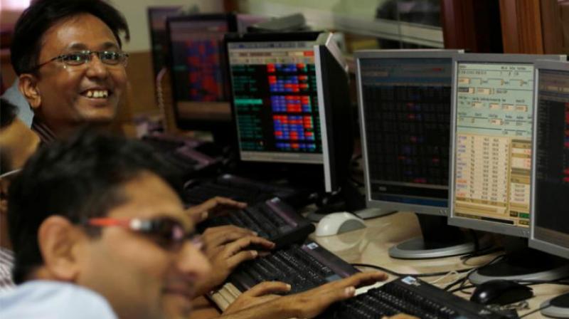 After hitting a high of 39,894.18, the 30-share index was trading 639.33 points, or 1.63 per cent, higher at 39,889.53 in mid-session, and the broader NSE Nifty advanced 175.85 points, or 1.51 per cent, to 11,803.65. (Photo: File | AP)