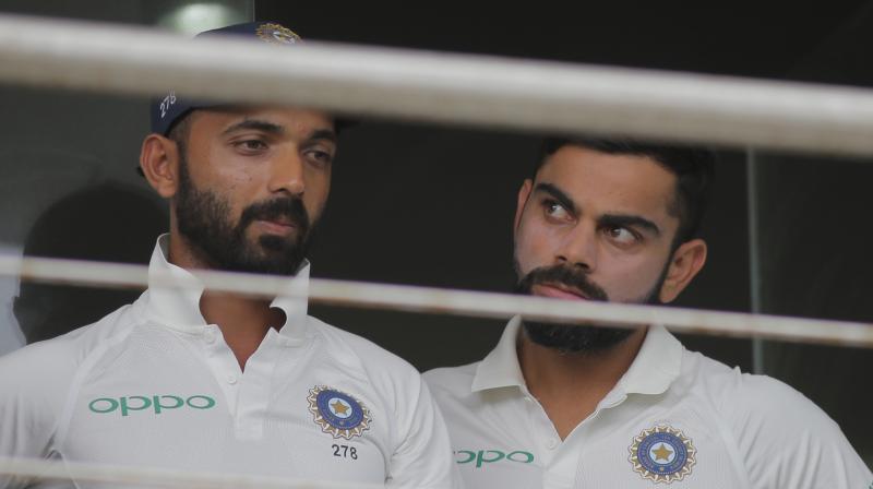 India captain Virat Kohli on Friday took a dig at critics questioning Ajinkya Rahane's exclusion in the first Test against South Africa, stating that those who wanted his deputy's omission are now clamouring for his comeback.(Photo: AP) India captain Virat Kohli on Friday took a dig at critics questioning Ajinkya Rahane's exclusion in the first Test against South Africa, stating that those who wanted his deputy's omission are now clamouring for his comeback.(Photo: AP)