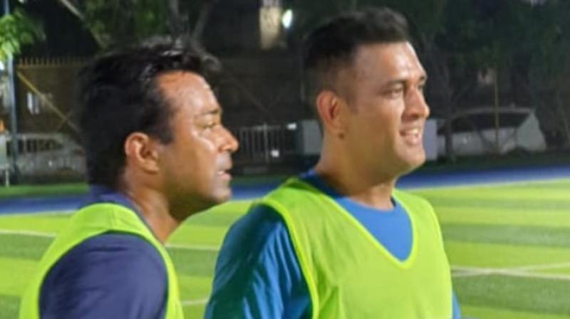 Although MS Dhoni and Leander Paes were seen wearing practice jerseys with "Playing for Humanity" written on them in the pictures, the cause of the charity and the date of the match is unclear. (Photo: Facebook/Rhiti Sports) Although MS Dhoni and Leander Paes were seen wearing practice jerseys with "Playing for Humanity" written on them in the pictures, the cause of the charity and the date of the match is unclear. (Photo: Facebook/Rhiti Sports)