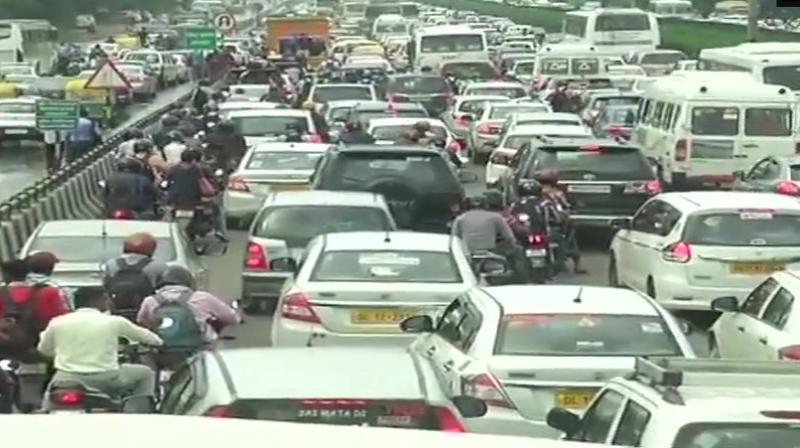 Traffic jam at Delhi-Jaipur Expressway due to waterlogging caused by heavy rainfall in parts of Delhi-NCR. (Photo: Twitter | ANI) Traffic jam at Delhi-Jaipur Expressway due to waterlogging caused by heavy rainfall in parts of Delhi-NCR. (Photo: Twitter | ANI)