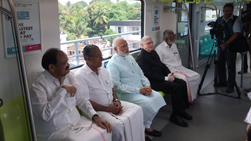 Prime Minister Narendra Modi takes a ride in Kochi Metro. Prime Minister Narendra Modi takes a ride in Kochi Metro.