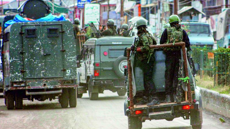 Security personnel near the site of fidayeen attack in Anantnag on Wednesday. (PTI) Security personnel near the site of fidayeen attack in Anantnag on Wednesday. (PTI)