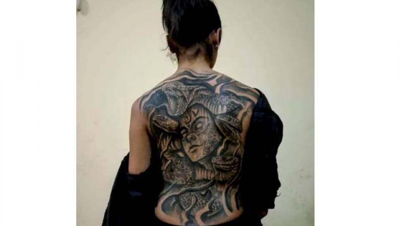 Neha has a tattoo of Medusa on her back. Neha has a tattoo of Medusa on her back.