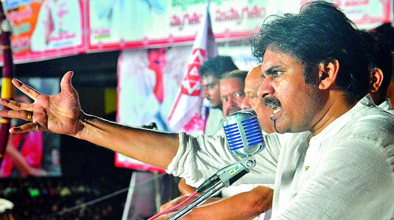 Jana Sena chief Pawan Kalyan addresses the public meeting at Tuni in East Godavari on Friday. (DC) Jana Sena chief Pawan Kalyan addresses the public meeting at Tuni in East Godavari on Friday. (DC)