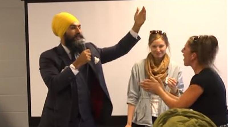 After four full minutes of her rant, the woman left the camping event after Singh attempted to postpone his address and was about to leave the dais. (Photo: Videograb) After four full minutes of her rant, the woman left the camping event after Singh attempted to postpone his address and was about to leave the dais. (Photo: Videograb)