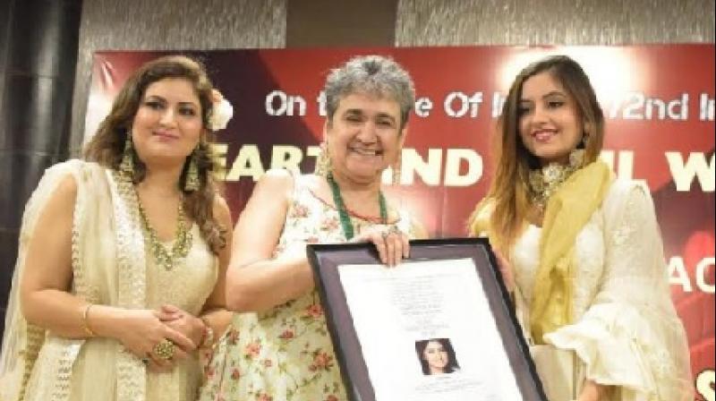 Mrs. Ratan Kaul and Shilpa Raina Wahal Presenting Momento to Srishti Kaur the Showstopper at Public Diplomacy Forum Mrs. Ratan Kaul and Shilpa Raina Wahal Presenting Momento to Srishti Kaur the Showstopper at Public Diplomacy Forum