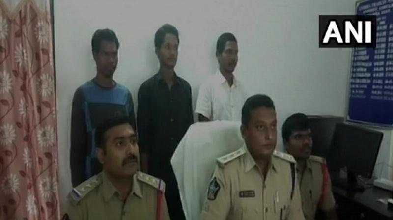 Police officials with the surrendered naxalites. (Photo: ANI) Police officials with the surrendered naxalites. (Photo: ANI)