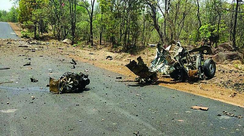 Mangled remains of a police vehicle carrying 16 security personnel that was allegedly bown up by Maoists using IED in Gadchiroli, Maharashtra, on Wednesday. (Photo: PTI) Mangled remains of a police vehicle carrying 16 security personnel that was allegedly bown up by Maoists using IED in Gadchiroli, Maharashtra, on Wednesday. (Photo: PTI)