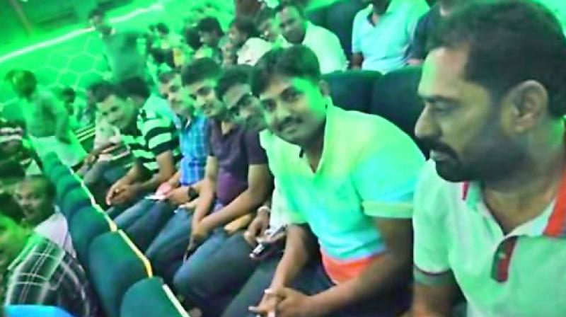 Suspended cops watching Sye Raa despite being on duty. Suspended cops watching Sye Raa despite being on duty.