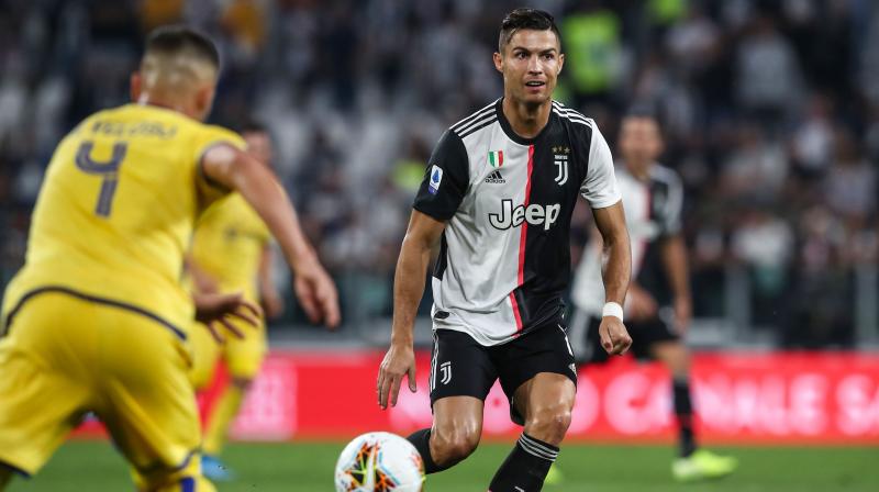 Goals from Aaron Ramsey and Cristiano Ronaldo helped Juventus to come from behind to beat Hellas Verona 2-1 at the Juventus Stadium on Saturday. (Photo:AFP) Goals from Aaron Ramsey and Cristiano Ronaldo helped Juventus to come from behind to beat Hellas Verona 2-1 at the Juventus Stadium on Saturday. (Photo:AFP)
