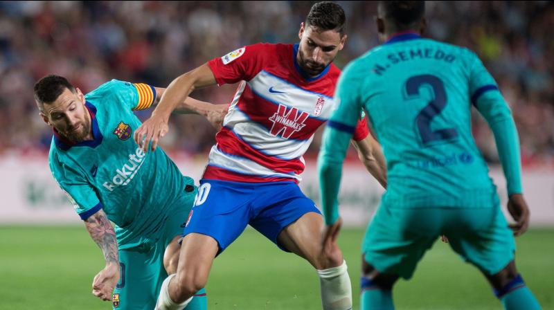 Barcelona threw on their stars of the present and the future but neither Lionel Messi nor Ansu Fati could save them from a dismal 2-0 defeat away at Granada. (Photo:AFP) Barcelona threw on their stars of the present and the future but neither Lionel Messi nor Ansu Fati could save them from a dismal 2-0 defeat away at Granada. (Photo:AFP)