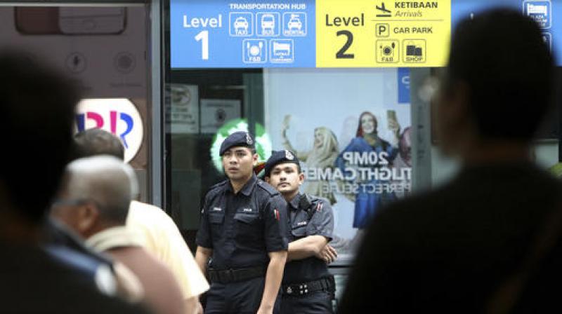 Police officers patrol inside the Kuala Lumpur International Airport in Sepang, Malaysia. (Photo: AP) Police officers patrol inside the Kuala Lumpur International Airport in Sepang, Malaysia. (Photo: AP)