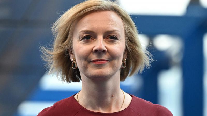 Britains Prime Minister Liz Truss arrives to attend the opening day of the annual Conservative Party Conference in Birmingham, central England, on October 2, 2022. (Oli SCARFF / AFP)