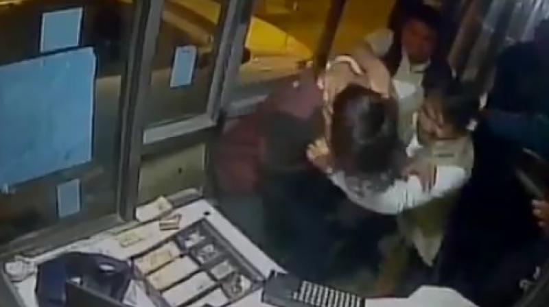 Yadav barged into the toll booth and started thrashing the victim. The booth was vandalized and all the things were thrown outside the booth. (Photo: Screengrab) Yadav barged into the toll booth and started thrashing the victim. The booth was vandalized and all the things were thrown outside the booth. (Photo: Screengrab)