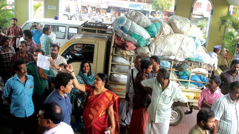 Public after seizing a lorry with hospital waste last week. The waste was then taken back to the hospital and unloaded under the leadership of the ward councillor. — FILE Public after seizing a lorry with hospital waste last week. The waste was then taken back to the hospital and unloaded under the leadership of the ward councillor. — FILE