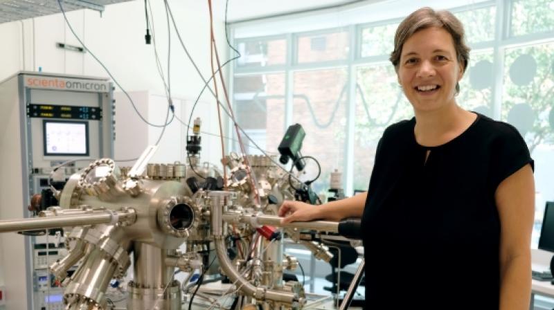 Professor Michelle Simmons with a scanning tunnelling microscope. Photo/UNSW Professor Michelle Simmons with a scanning tunnelling microscope. Photo/UNSW