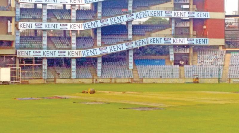 Ferozeshah Kotla wicket sports a greenish tinge on Wednesday. The third Test begins on Saturday. Ferozeshah Kotla wicket sports a greenish tinge on Wednesday. The third Test begins on Saturday.