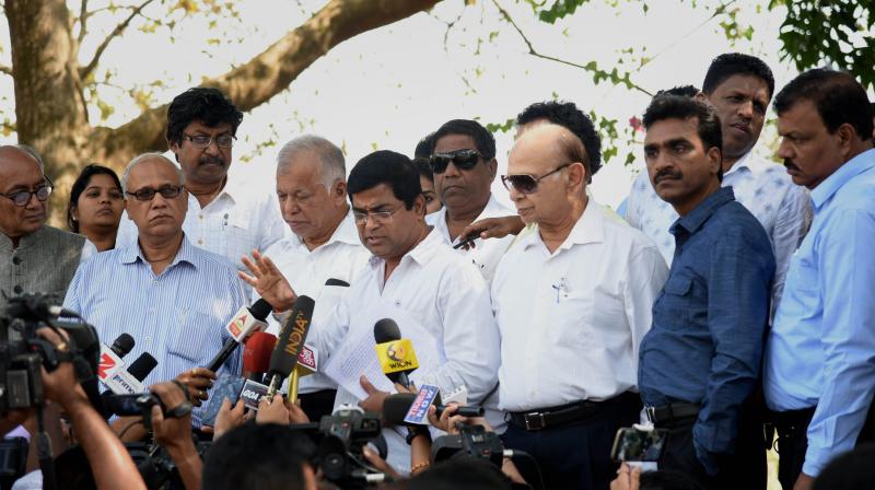 Congress MLAs, accompanied by party General Secretary Digvijay Singh, addressing the media after meeting the Governor Mridula Sinha in Panaji. (Photo: PTI) Congress MLAs, accompanied by party General Secretary Digvijay Singh, addressing the media after meeting the Governor Mridula Sinha in Panaji. (Photo: PTI)